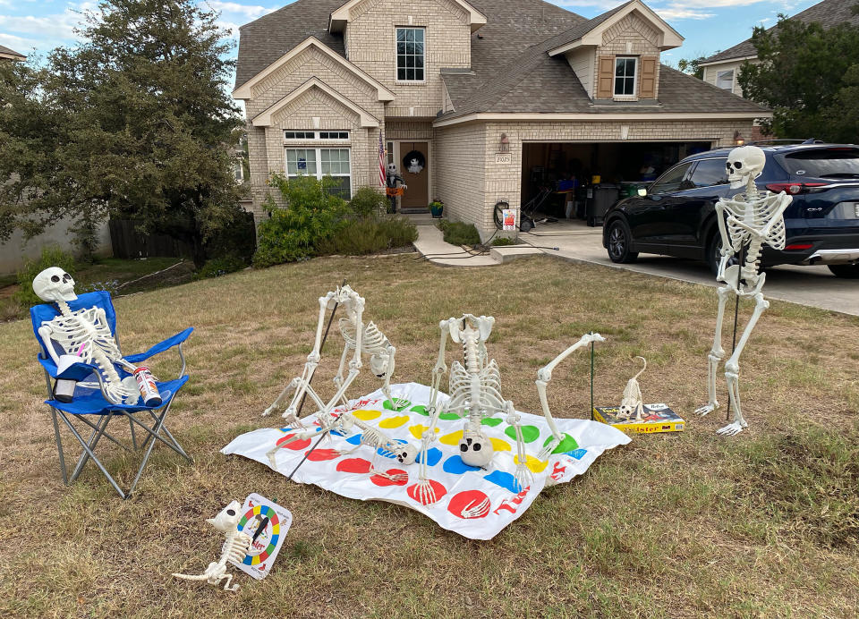 A group of skeletons play Twister on the lawn of Steven and Danielle Dinote. (Courtesy Steven Dinote)