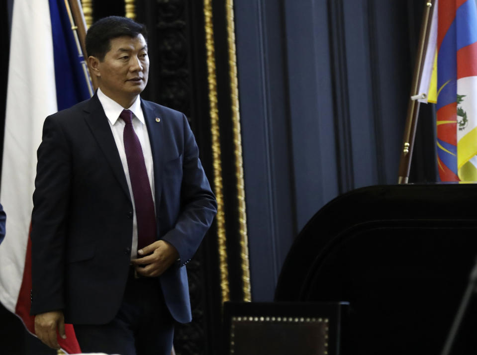 Tibetan government-in-exile Prime Minister Lobsang Sangay arrives at the Prague's city hall during his visit to Czech Republic, Wednesday, March 6, 2019. (AP Photo/Petr David Josek)