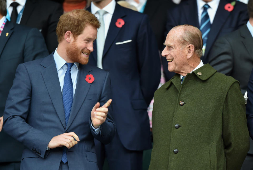 LONDON, UNITED KINGDOM - OCTOBER 31: (EMBARGOED FOR PUBLICATION IN UK NEWSPAPERS UNTIL 48 HOURS AFTER CREATE DATE AND TIME) Prince Harry and Prince Philip, Duke of Edinburgh attend the 2015 Rugby World Cup Final match between New Zealand and Australia at Twickenham Stadium on October 31, 2015 in London, England. (Photo by Max Mumby/Pool/Indigo/Getty Images)