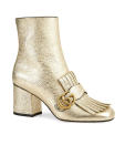 <p>Gucci Metallic Ankle Boot, Price Upon Request, <a href="http://www.gucci.com/cn-en/styles/408210DKT007100#" rel="nofollow noopener" target="_blank" data-ylk="slk:gucci.com;elm:context_link;itc:0;sec:content-canvas" class="link ">gucci.com</a><br><br></p>