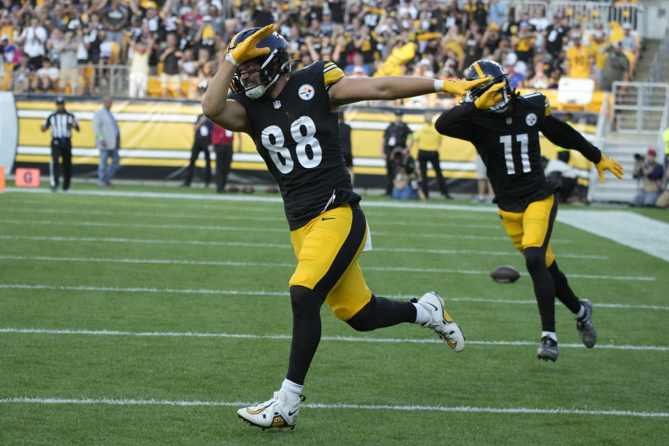 Pittsburgh Steelers tight end Pat Freiermuth (88) celebrates after scoring a touchdown in the first half of an NFL preseason football game against the Buffalo Bills, in Pittsburgh, Saturday, Aug. 19, 2023. (AP Photo/Gene Puskar)