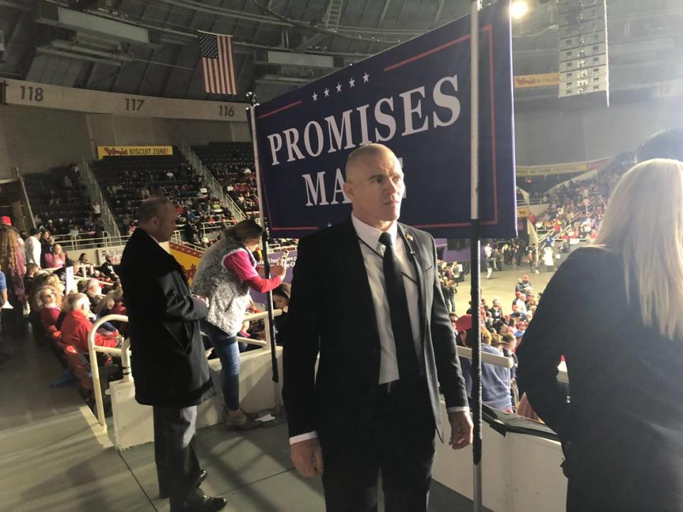 Jordan Goudreau working security at what appears to be a political event for Donald Trump.