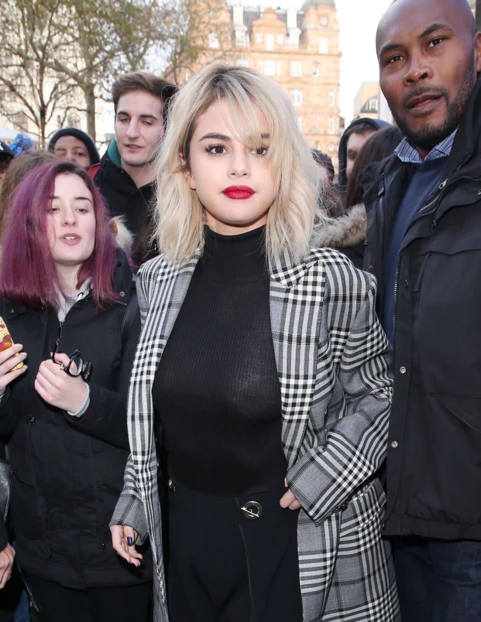 Showing the Weeknd what he's missing? American singer Selena Gomez suffers an embarrassing wardrobe malfunction by going bra-less whilst out and about. Source: Backgrid