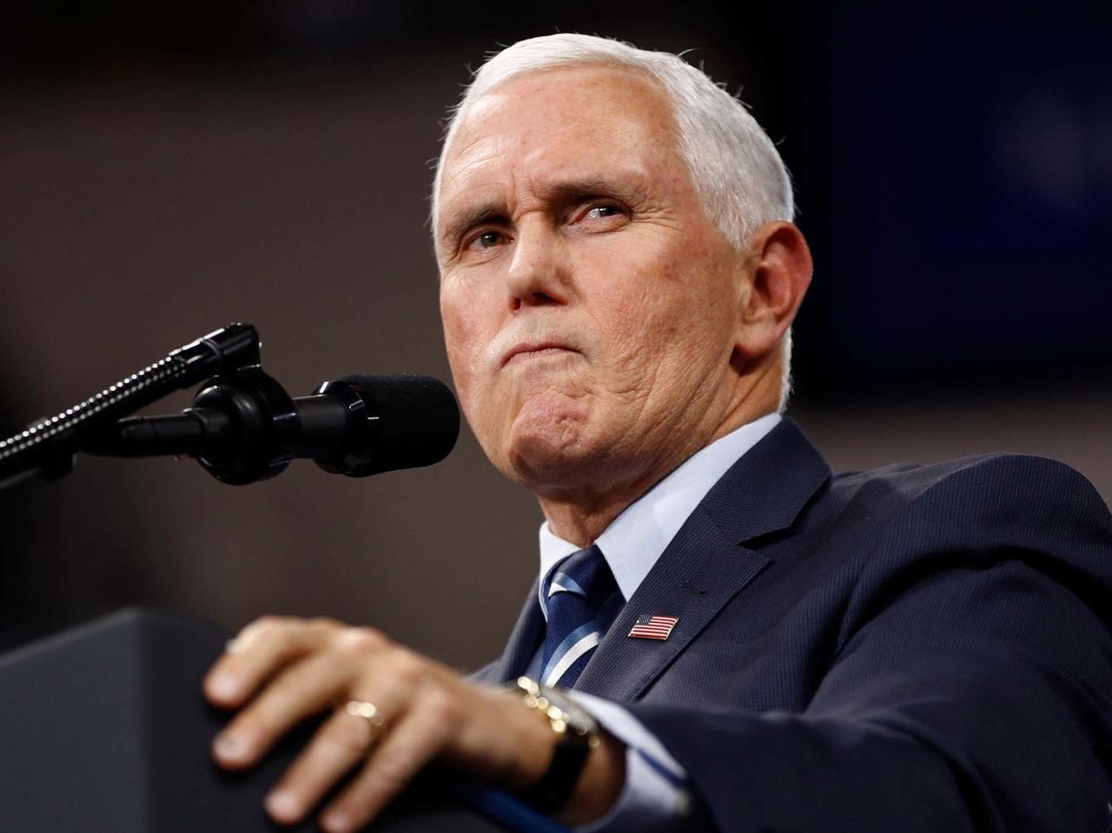 Vice President Mike Pence introduces President Donald Trump to speak at a campaign rally: AP