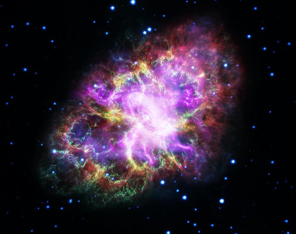 Image of the Crab Nebula where red is radio from the Very Large Array, yellow is infra-red from the Spitzer Space Telescope, green is visible from the Hubble Space Telescope, and blue and purple are X-ray from the XMM-Newton and Chandra X-ray Observatories respectively. NASA, ESA, G. Dubner (IAFE, CONICET-University of Buenos Aires) et al.; A. Loll et al.; T. Temim et al.; F. Seward et al.; VLA/NRAO/AUI/NSF; Chandra/CXC; Spitzer/JPL-Caltech; XMM-Newton/ESA; and Hubble/STScI