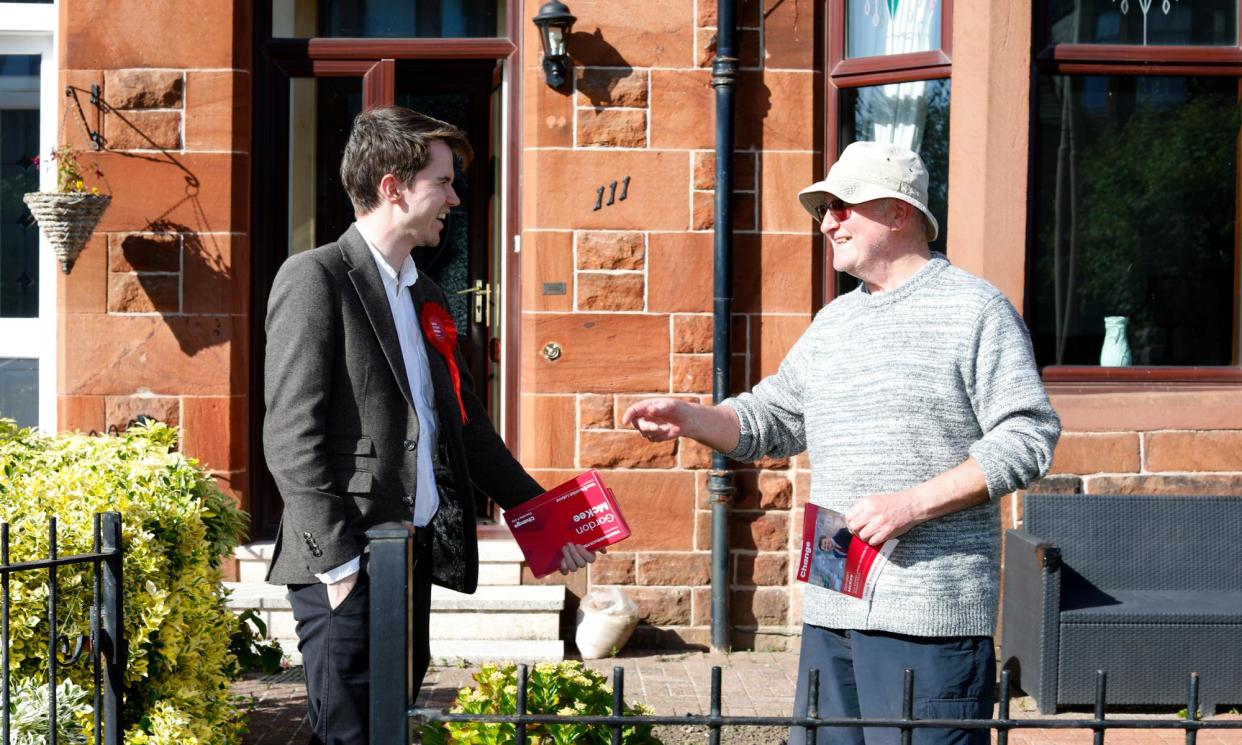 <span>Labour candidate Gordon McKee talking to a constituent in Glasgow South.</span><span>Photograph: Katherine Anne Rose/The Observer</span>