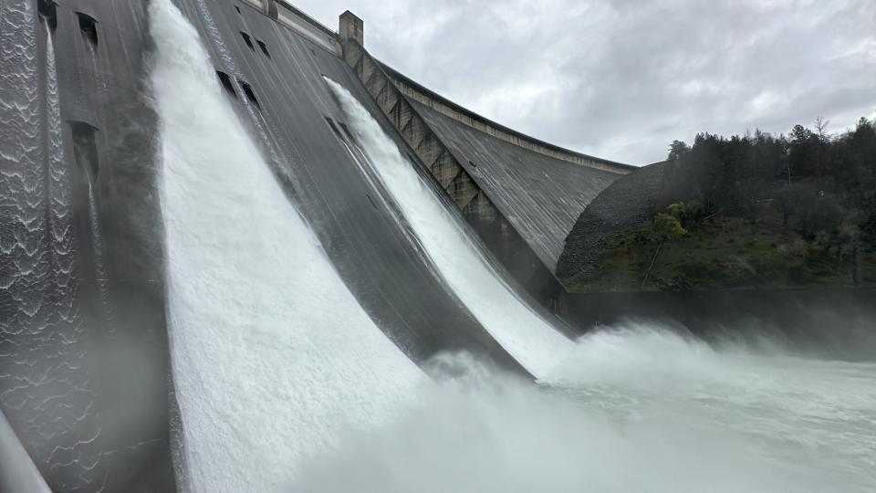 Water flows from the spillway at Shasta Dam on Wednesday, Feb. 21, 2024. The releases from the dam are expected to increase to 35,000 cubic feet per second.