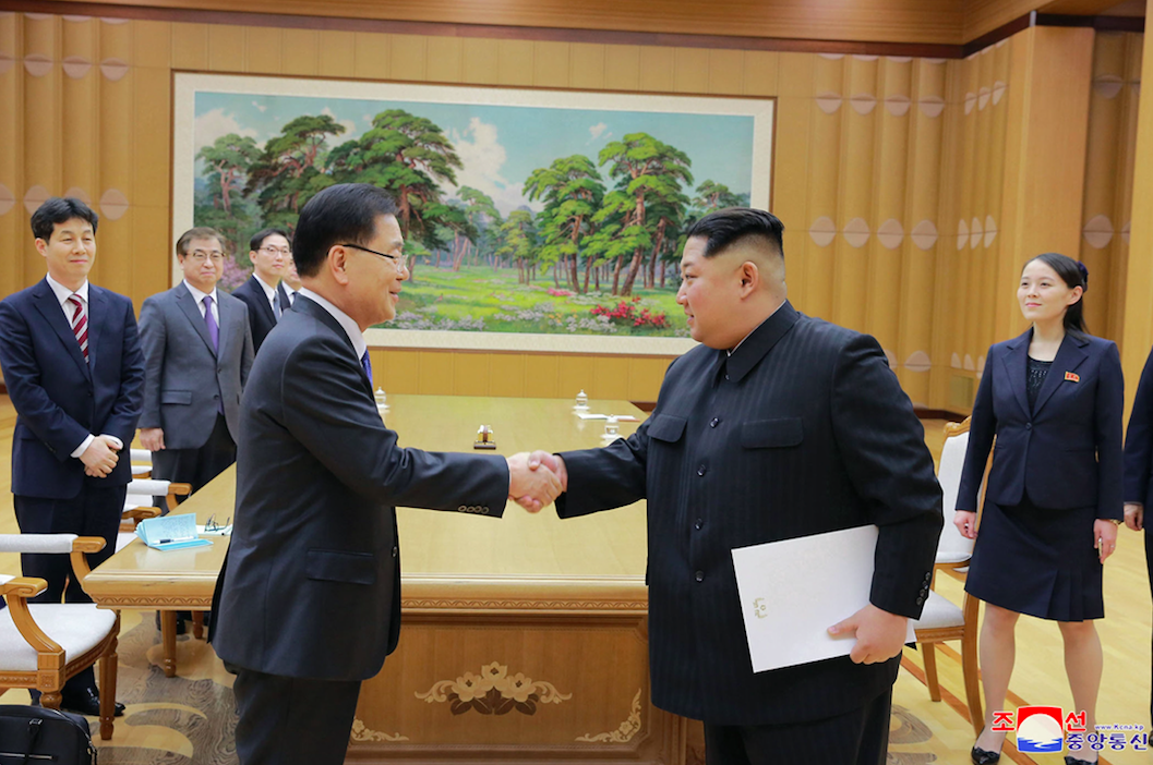 <em>Kim Jong-un (right) shakes hands with South Korean National Security Director Chung Eui-yong (AP)</em>