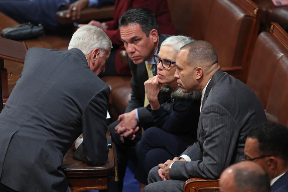 U.S. House Democratic Leader Steny Hoyer (D-MD) talks to Rep.-elect Pete Aguilar (D-CA), Rep.-elect Rep. Katherine Clark (D-MA) and Rep.-elect Hakeem Jeffries (D-NY) in the House on Jan. 4.