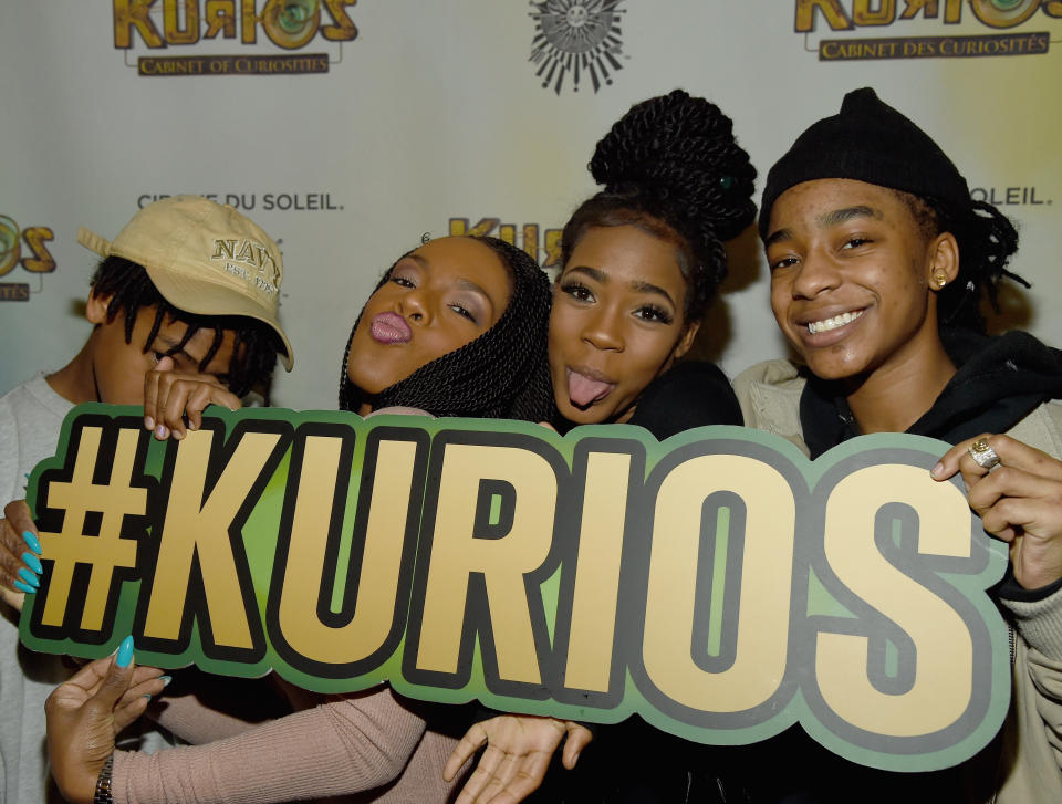 (L-R) Robert Kelly Jr., Andrea (Drea) Kelly, Joann “Buku Abi” Kelly, and Jaah Kelly attend Cirque du Soleil’s KURIOS in March 2016 in Atlanta