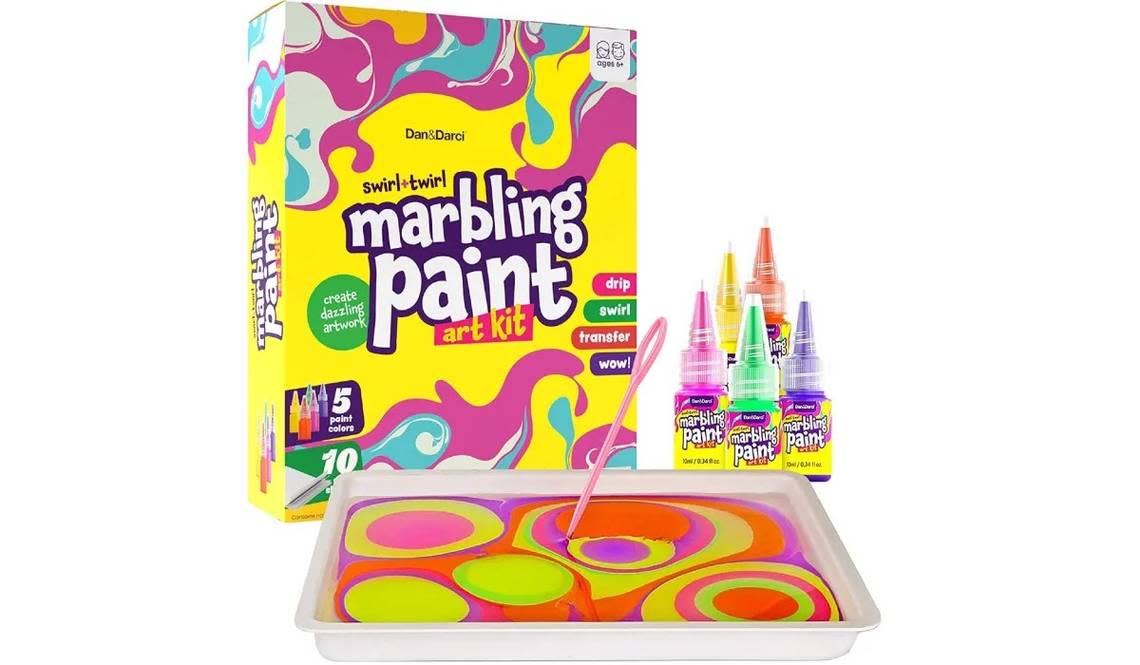 Your child will love creating a dazzling work of art with this marbling paint kit. (Source: Amazon)
