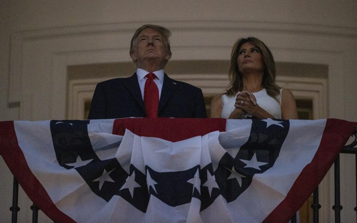 Donald Trump and first Lady Melania Trump watch fireworks at the White House on July 4 - Getty