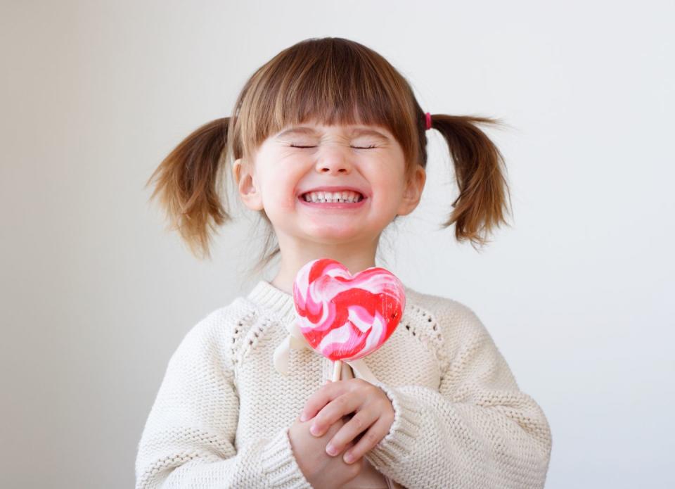 kid with heart lollipop valentines day jokes