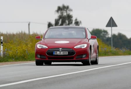 FILE PHOTO: Tesla Model S drives during electric car E-Rallye Baltica 2019 in Latvia