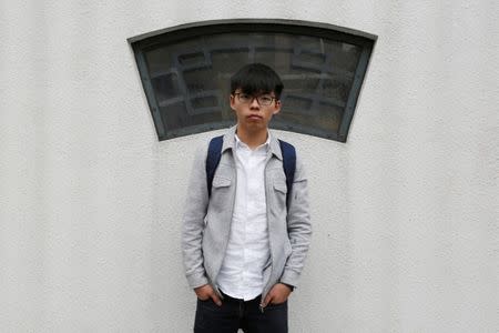 FILE PHOTO: Pro-democracy student leader Joshua Wong, 20, poses near his home in Hong Kong, China March 31, 2017. REUTERS/Bobby Yip/File Photo