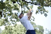 Scottie Scheffler watches his shot off the third hole during the third round of the Charles Schwab Challenge golf tournament at the Colonial Country Club, Saturday, May 28, 2022, in Fort Worth, Texas. (AP Photo/Emil Lippe)