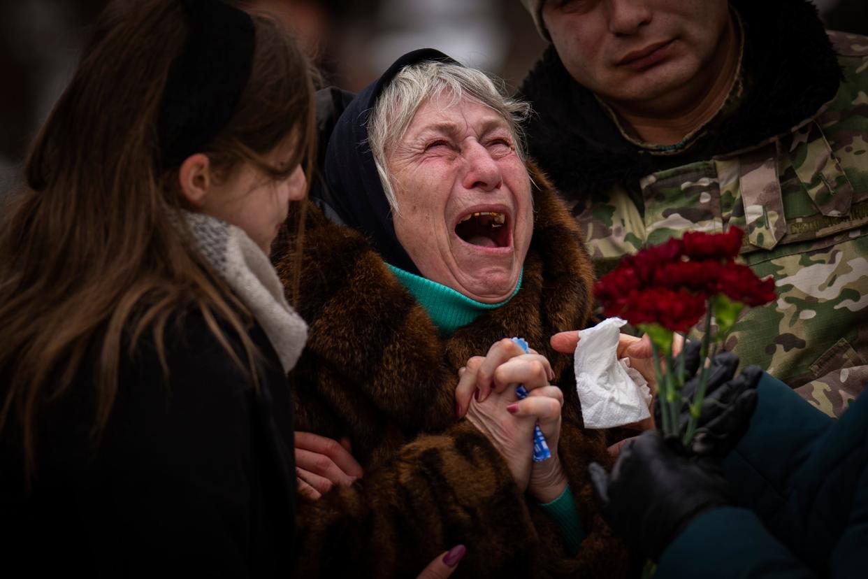 Nina Nikiforovа, 80, cries outside a church after attending the funeral of her son Oleg Kunynets, a Ukrainian military serviceman who was killed in the east of the country, in Kyiv (Copyright 2023 The Associated Press. All rights reserved.)