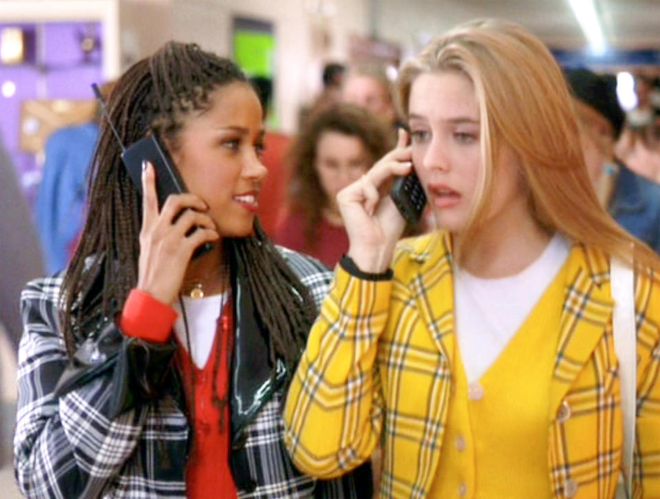 LOS ANGELES - JULY 21: The movie "Clueless", written and directed by Amy Heckerling. Seen here from left, Stacey Dash (as Dionne Davenport), and Alicia Silverstone (as Cher Horowitz).  Theyre using cell phones. Theatrical wide release, Friday, July 21, 1995. Screen capture. Paramount Pictures. (Photo by CBS via Getty Images)