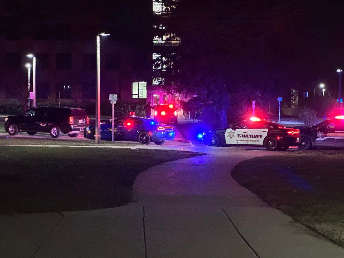 Emergency personnel respond to a shooting at Michigan State University in East Lansing, Michigan, 13 February 2023 (Reuters)