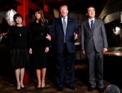 <p>President Donald Trump (2nd R) and Japan’s Prime Minister Shinzo Abe meet with their wives Melania (2nd L) and Akie for a dinner at a restaurant in Tokyo, Japan, November 5, 2017. (Photo: Kim Kyung-Hoon / Pool/Anadolu Agency/Getty Images) </p>