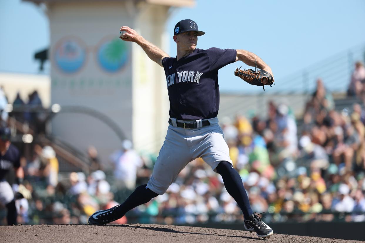 Mar 11, 2023; Bradenton, Florida, USA; New York Yankees pitcher Ian Hamilton (71) throws a pitch against the Pittsburgh Pirates during the fourth inning at LECOM Park. Mandatory Credit: Kim Klement-USA TODAY Sports