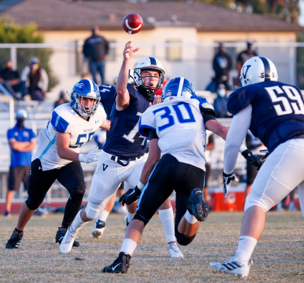Venice quarterback Sam Vaulton throws a pass during the Gondoliers' victory over Palisades on Friday, April 9, 2021.