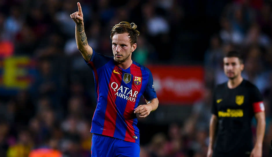 Ivan Rakitic of FC Barcelona celebrates after scoring his team's first goal during the La Liga match between FC Barcelona and Club Atletico de Madrid at the Camp Nou stadium