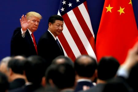 U.S. President Donald Trump and China's President Xi Jinping meet business leaders at the Great Hall of the People in Beijing