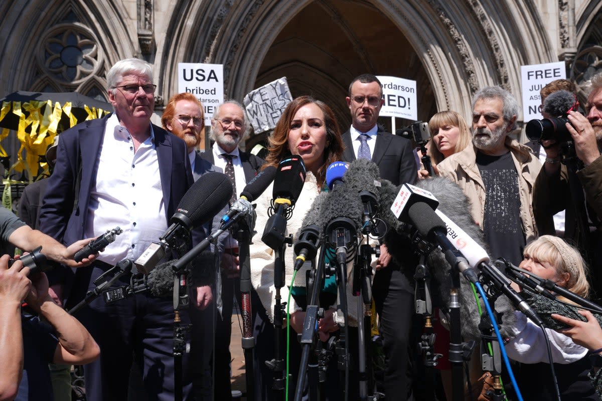 Stella Assange gives a statement outside the Royal Courts of Justice in London after he won the right to appeal against his extradition to the US (Lucy North/PA Wire)