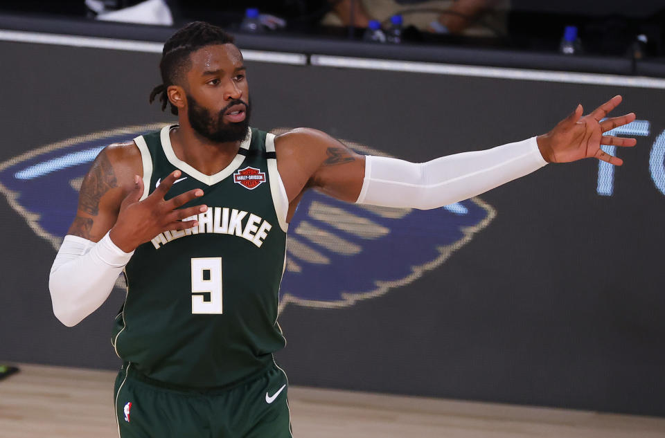 Wesley Matthews #9 of the Milwaukee Bucks reacts after hitting a three point basket  against the Dallas Mavericks during the fourth quarter at The Arena at ESPN Wide World Of Sports Complex.