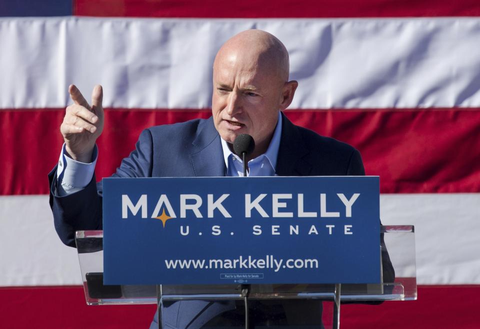 FILE - In this Feb. 2019 file photo, former astronaut Mark Kelly speaks during his senate campaign kickoff event in Tucson, Ariz. If Arizona Democrat Mark Kelly wins a seat in the U.S. Senate, he could take office as early as Nov. 30, 2020. A Kelly victory would shrink the GOP's Senate majority at a crucial moment and complicate the path to confirmation for President Donald Trump's Supreme Court nominee.(Mike Christy/Arizona Daily Star via AP, File)