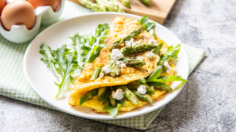 omelet with asparagus on plate