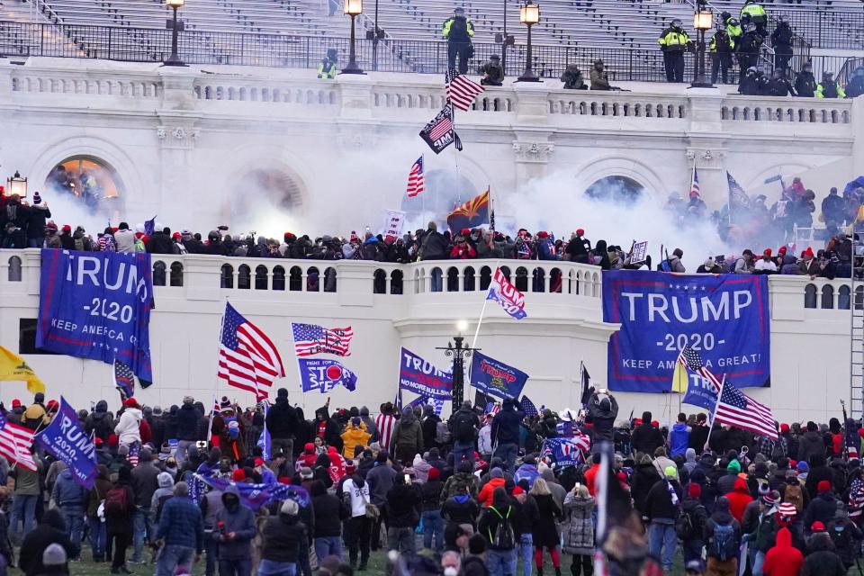 Rioters at the U.S. Capitol on Jan. 6, 2021, in Washington.  Daniel “D.J.” Rodriguez, a California man who drove a stun gun into a police officer's neck during one of the most violent clashes of the U.S. Capitol riot was sentenced on Wednesday to more than 12 years in prison.  Rodriguez yelled, “Trump won!” as he was led out of the courtroom where U.S. District Judge Amy Berman Jackson sentenced him to 12 years and seven months behind bars for his role in the Jan. 6, 2021, attack.