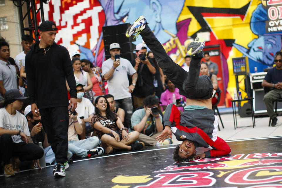 B-boys Frankie, right, and Whoran compete during Red Bull BC One event on, Saturday, July 24, 2021. in New York, NY. Many in the breaking community are eager for the art form to expand its audience after the International Olympic Committee announced that it would become an official sport at the Paris 2024 games. But that optimism is hardly unanimous. (AP Photo/Eduardo Munoz Alvarez)