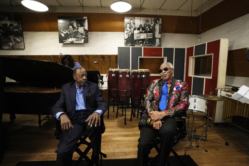 Henry Fambrough, left, and G.C. Cameron of the Spinners are interviewed inside Studio A at the Motown Museum, Friday, May 19, 2023, in Detroit. The museum welcomed the iconic soul group where group members donated uniforms and other memorabilia from their Motown days. (AP Photo/Carlos Osorio)