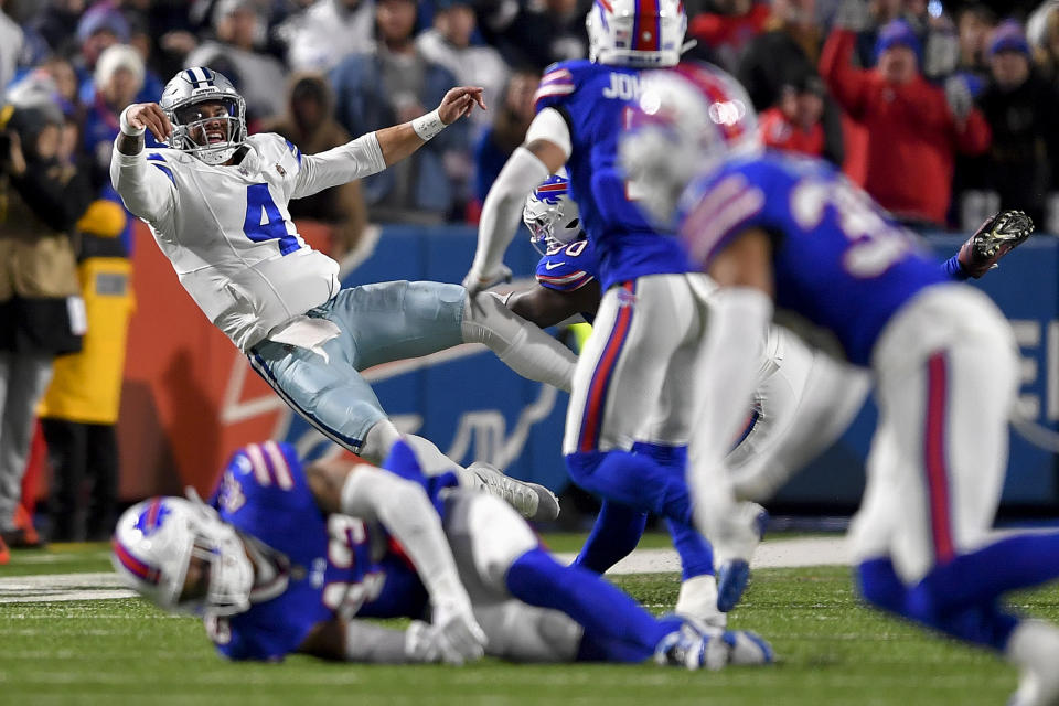 Dallas Cowboys quarterback Dak Prescott (4) passes against the Buffalo Bills during the second half of an NFL football game, Sunday, Dec. 17, 2023, in Orchard Park, N.Y. (AP Photo/Adrian Kraus)