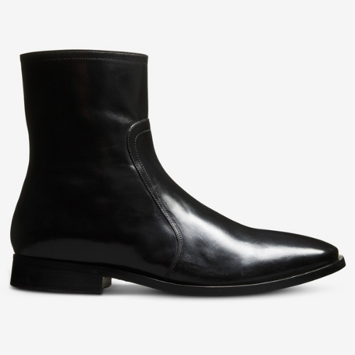 Allen Edmonds black beatle boot against white background