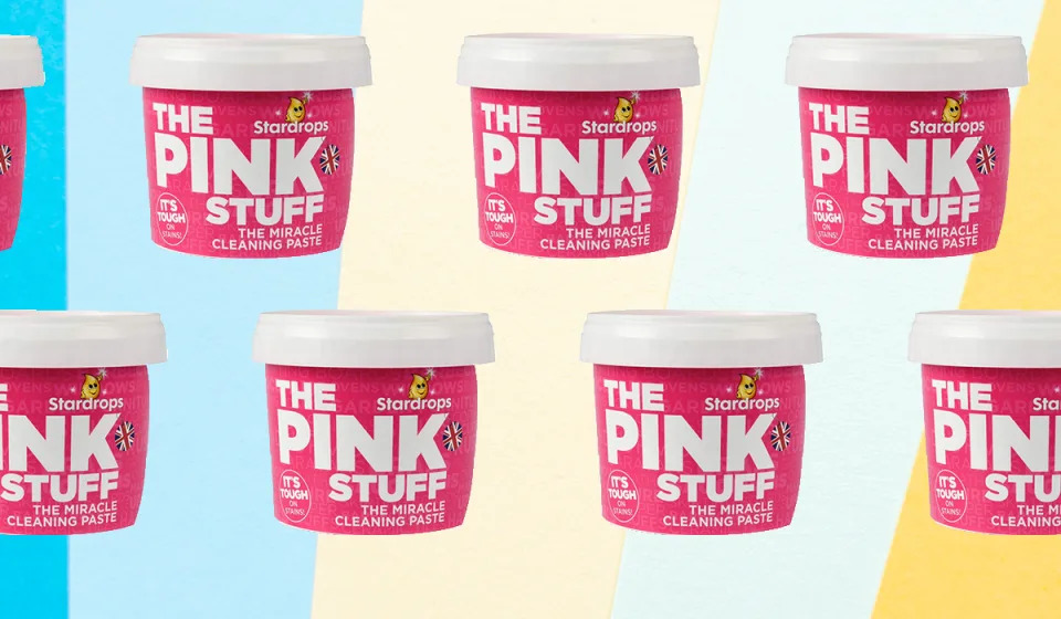 Multiple pink tubs with white lids and label 