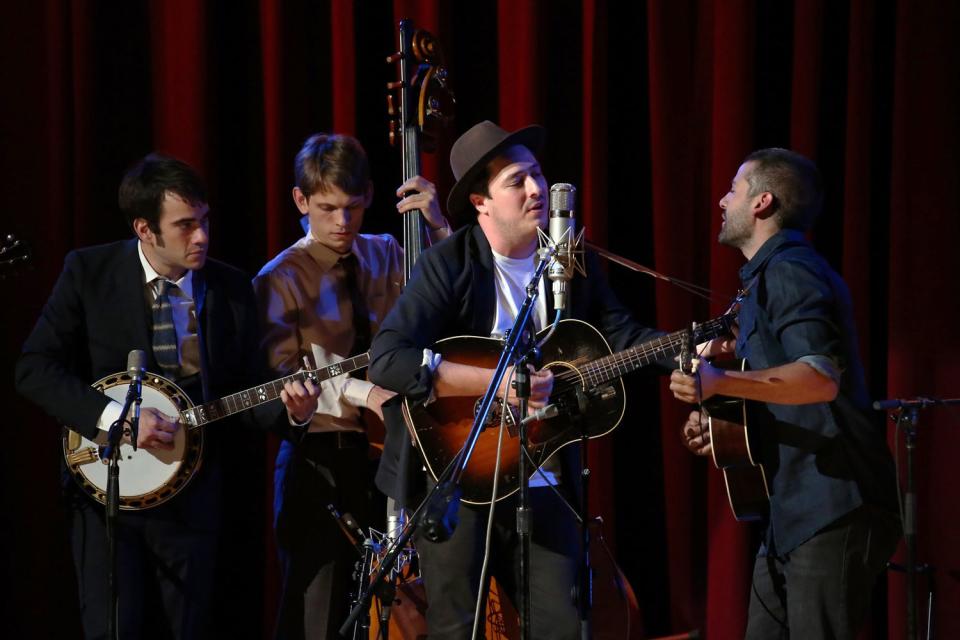 Marcus Mumford performs on stage with actor Oscar Issac and the Punch Brothers during the one-night-only concert "Another Day, Another Time: Celebrating The Music Of Inside Llewyn Davis Presented By Joel Coen, Ethan Coen and T Bone Burnett" and featuring actors Oscar Isaac, John Goodman, Carey Mulligan, Stark Sands and musicians Jack White, Patti Smith, Willie Watson, Gillian Welch, Dave Rawlings, Secret Sisters, Punch Brothers, Connor Oberst, Marcus Mumford, Colin Meloy, Lake Street Dive, Rhiannon Giddens, Joan Baez and The Avett Brothers at The Town Hall on September 29, 2013 in New York City