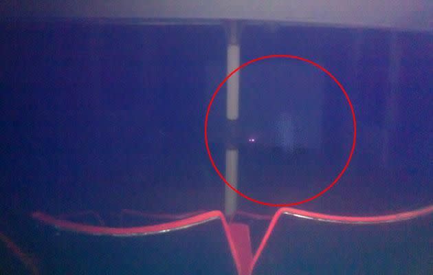 Daniel says the misty figure could only be seen on the photo. Photo: Caters News