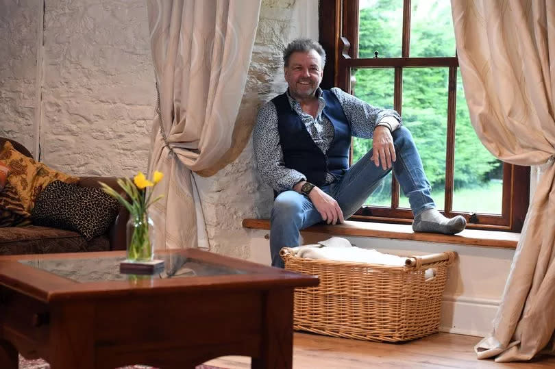 Martin at his beautifully renovated Welsh farmhouse Tynewydd