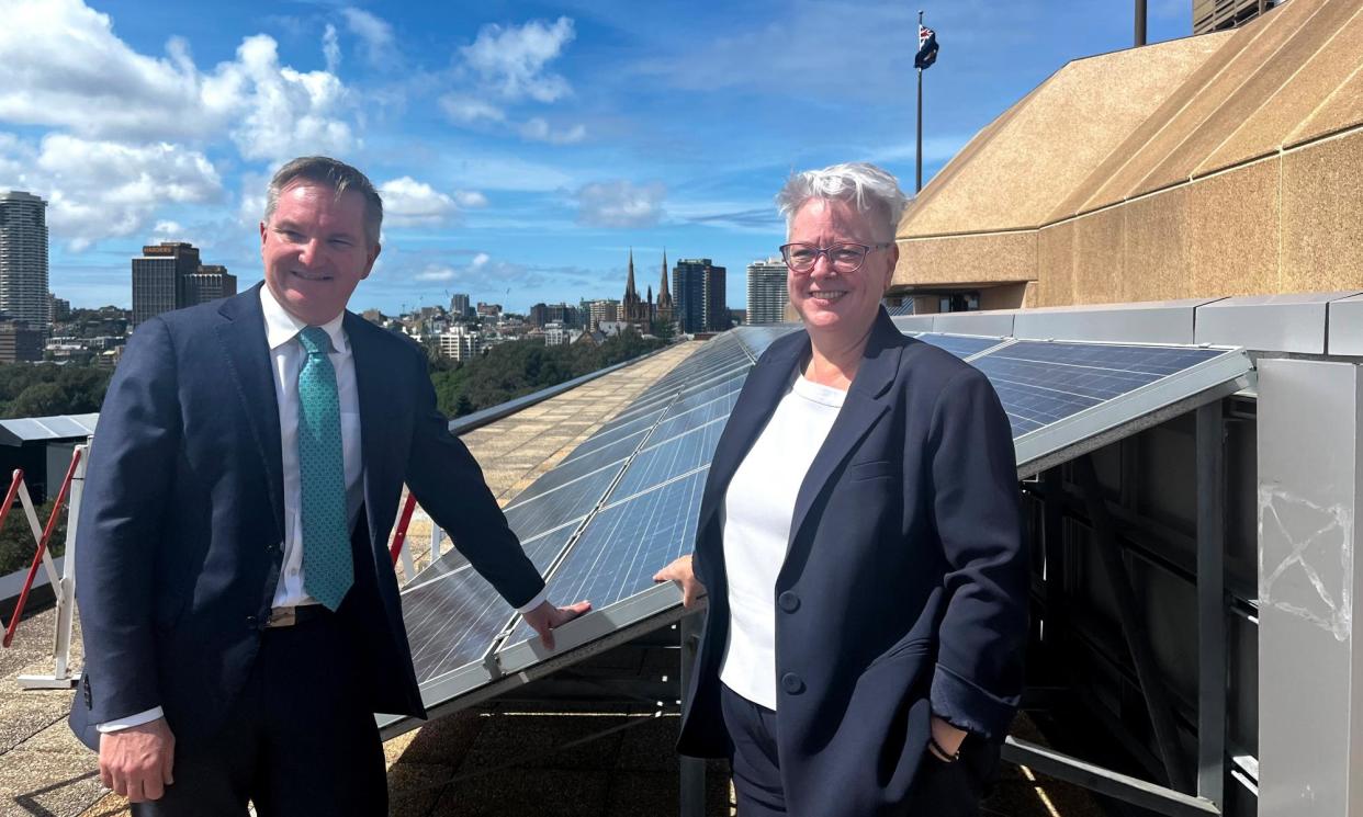 <span>NSW energy minister Penny Sharpe and federal minister Chris Bowen with solar panels on the roof of NSW Parliament House in Sydney, 22 November, 2023. </span><span>Photograph: Bray Boland/AAP</span>