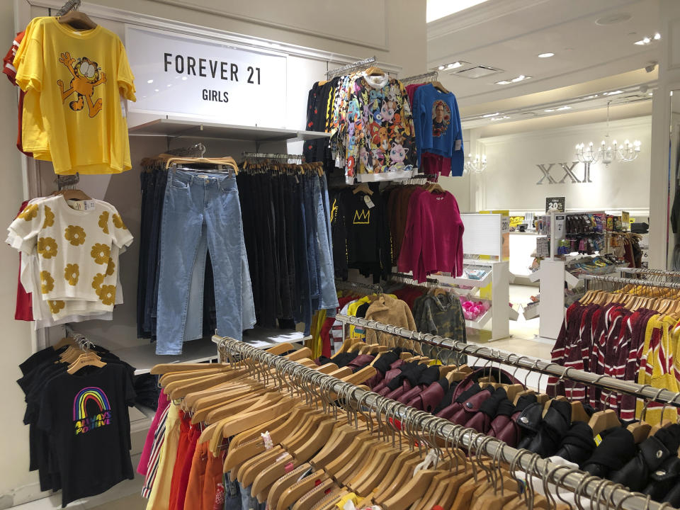 A Forever 21 store is shown, Monday, Sept. 30, 2019, in Aventura, Fla. The low-price fashion chain, a one-time hot destination for teen shoppers that fell victim to its own rapid expansion and changing consumer tastes, has filed for Chapter 11 bankruptcy protection. (AP Photo/Wilfredo Lee)