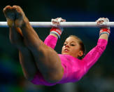 Shawn Johnson of the USA practices on the uneven bars ahead of the Beijing 2008 Olympic Games at the National Indoor Stadium on August 7, 2008 in Beijing, China.