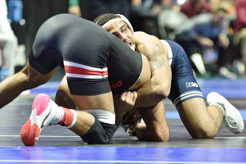 Penn State’s Aaron Brooks controls Ohio State’s Kaleb Romero in their 184-pound quarterfinals match of the NCAA Championships on Friday, March 17, 2023 at the BOK Center in Tulsa, Okla. Brooks beat Romero, 4-1.