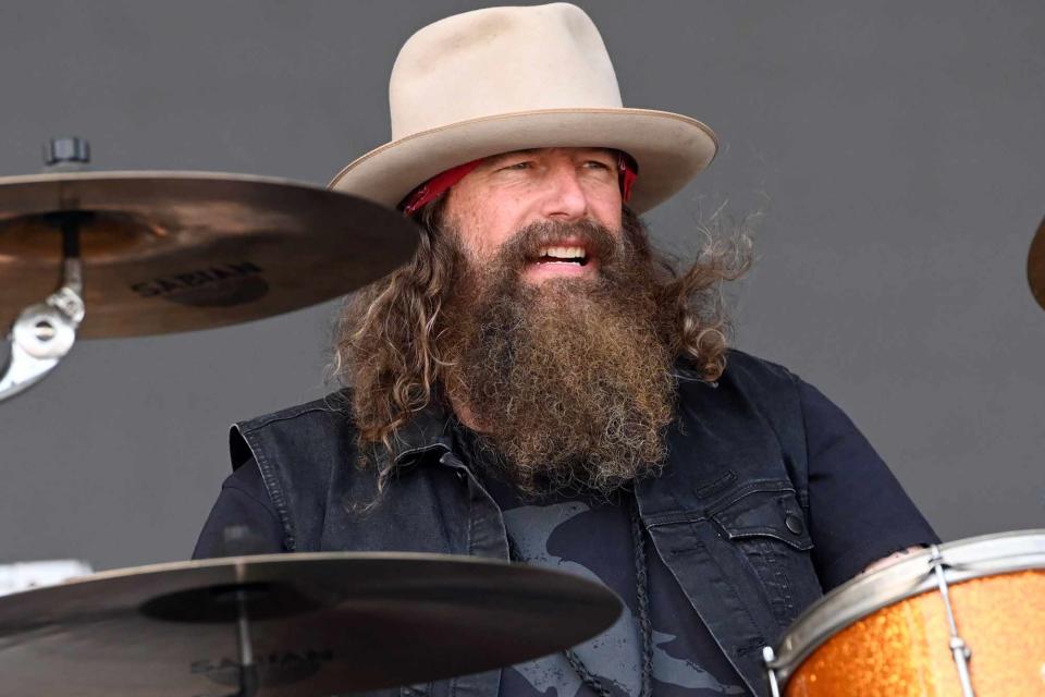 <p>Stephen J. Cohen/Getty</p> Brit Turner of Blackberry Smoke performs in Louisville in September 2019