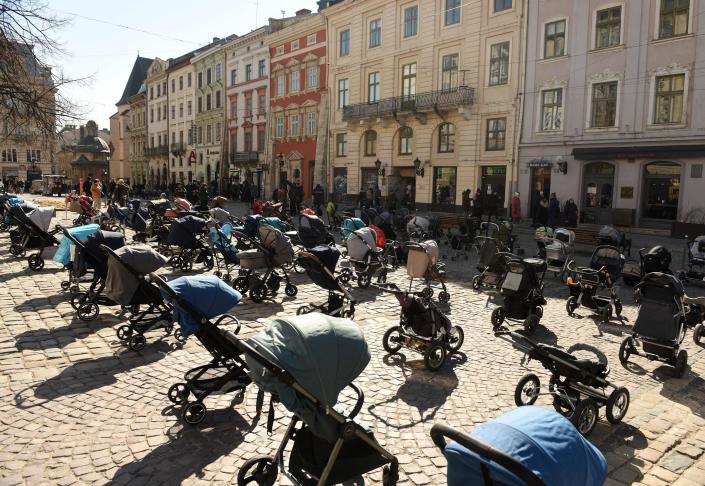 109 empty strollers placed outside the Lviv city council on March 18, 2022 commemorate the number of children killed in Russia&#39;s ongoing invasion of Ukraine.