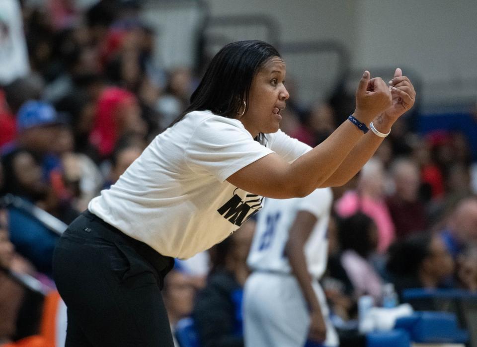 Wildcats head coach Jade Brown instructs her players during the Mainland vs Washington girls 5A Regional Finals basketball game at Booker T. Washington High School in Pensacola on Thursday, Feb. 22, 2024.