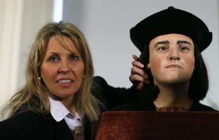 File photo of Philippa Langley, originator of the "Looking for Richard" project, poses with a facial reconstruction of King Richard III at a news conference in central London February 5, 2013. REUTERS/Andrew Winning