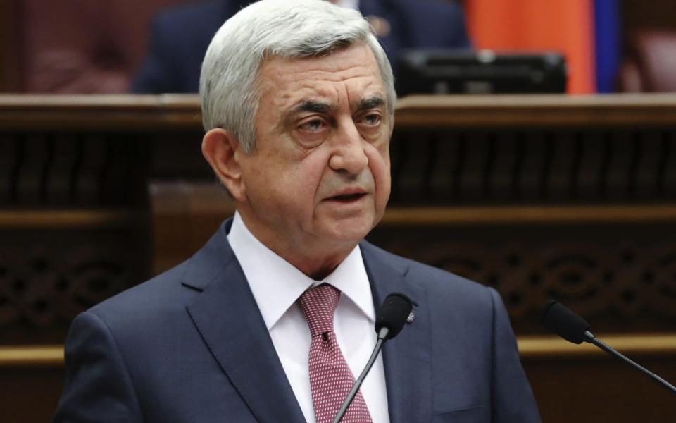 Serzh Sargsyan, who had moved from the presidency to become prime minister this month, speaks in parliament last week  - AFP